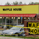 Police tape blocks off a Waffle House in Antioch, Tenn., outside Nashville on April 22, 2018, where four people died after a gunman opened fire at the restaurant.